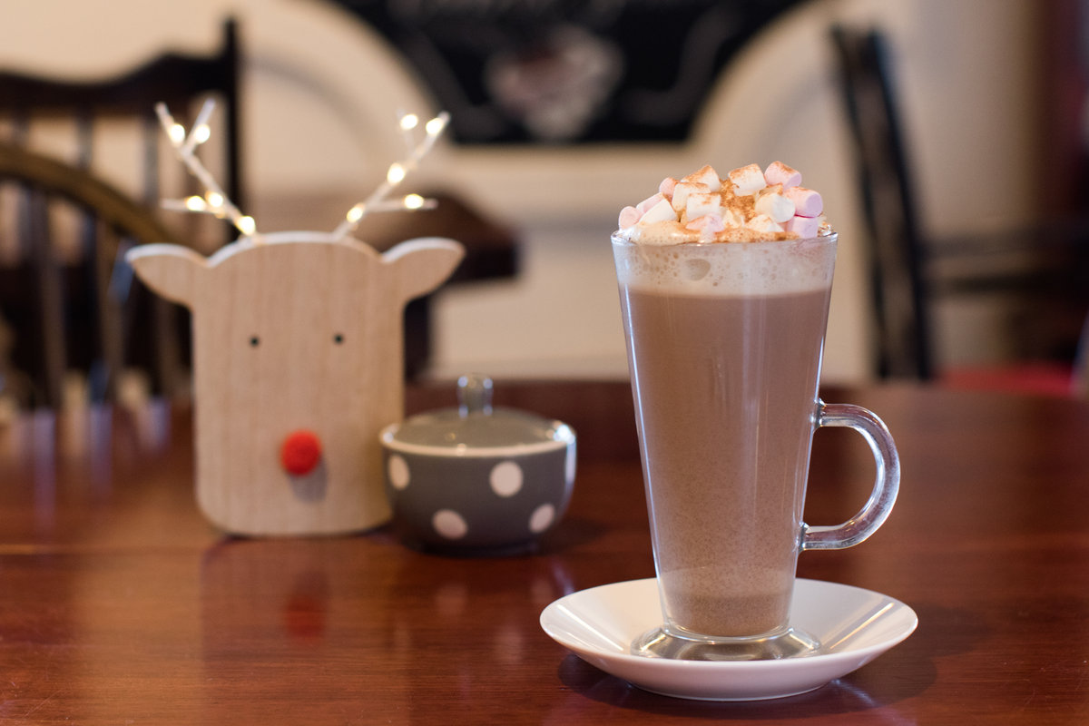 Indulgent hot chocolate with whipped cream and marshmallows at the Tea Room cafe in Knutsford