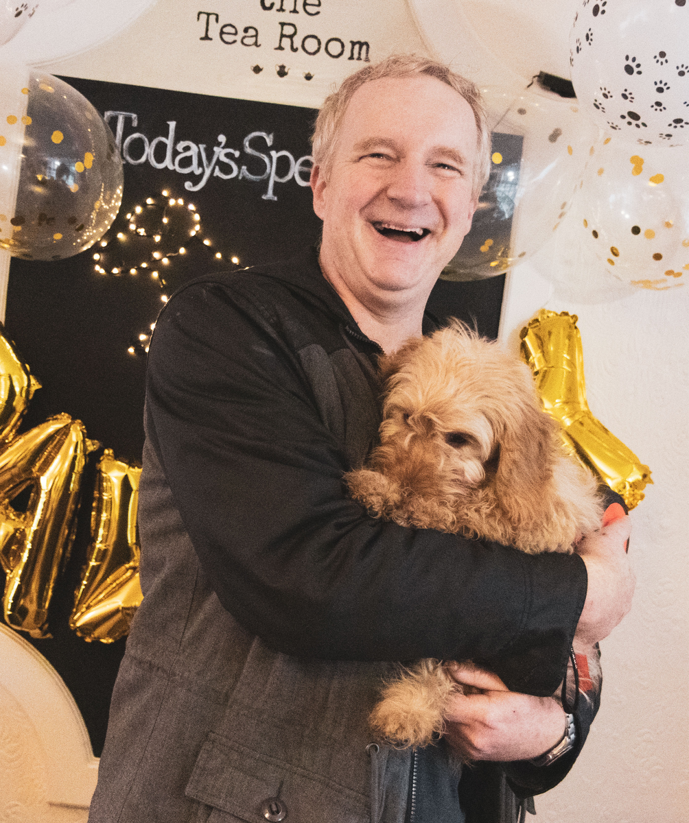 Customer with dog at the dog-friendly cafe, the Tea Room in Knutsford