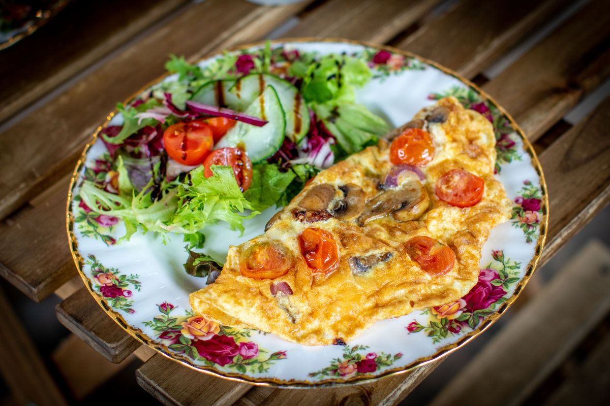 Freshly made vegetarian omelette served on a plate with salad at the Tea Room in Knutsford