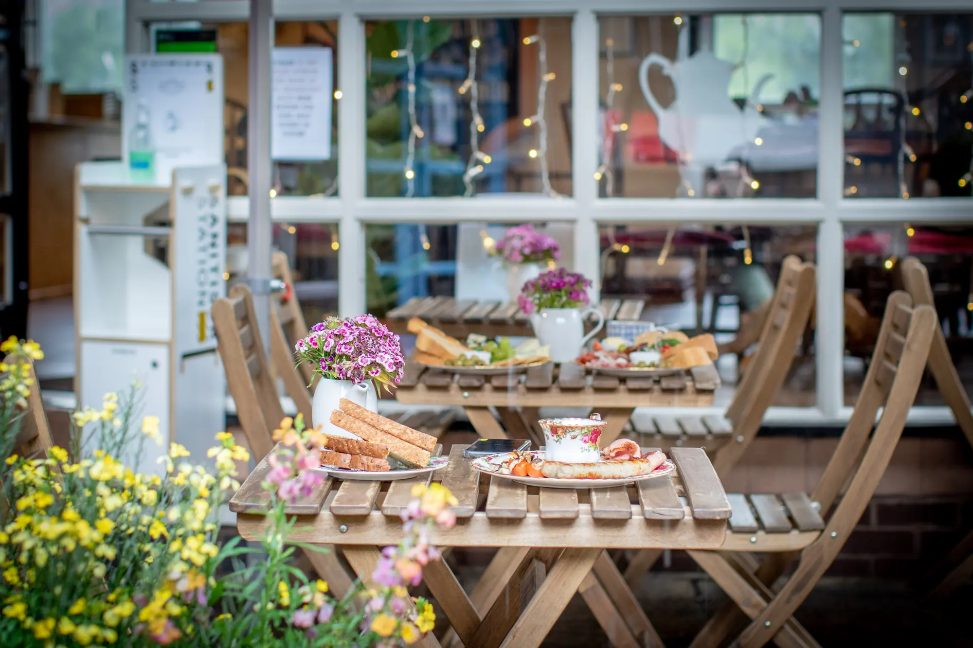 Tea, breakfast and flowers on the Tea Room’s courtyard tables