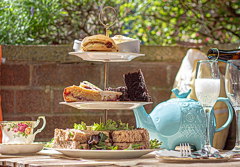 Afternoon tea with homemade cakes, scones and finger sandwiches, photographed for the Tea Room