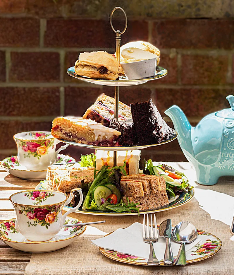 Afternoon tea with homemade cakes, scones and finger sandwiches, photographed for the Tea Room